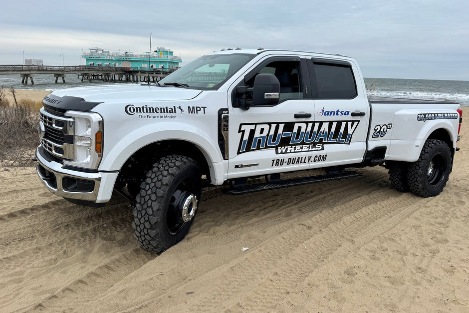 Side view of 2024 Ford F450 with 37-inch tires, no lift kit