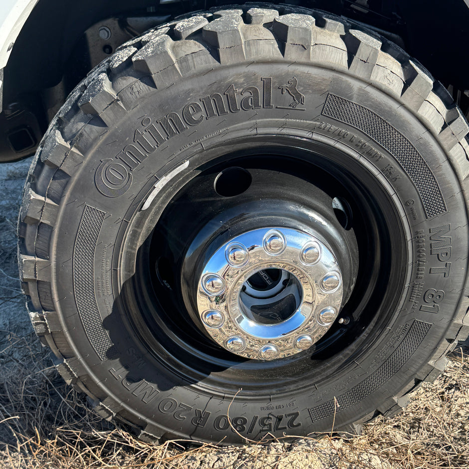 Close-up Side view of 2024 Ford F450 wheel with 37-inch tires, no lift kit